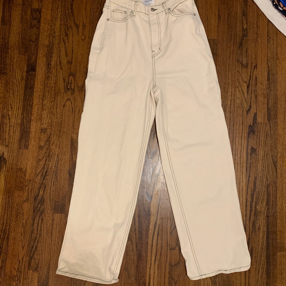 Cream straight leg jeans